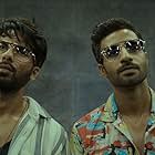 Shahid Kapoor and Bhuvan Arora in Farzi (2023)