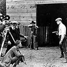 Pat Chrisman, Fred LeRoy Granville, Tom Mix, and Arthur Rosson in The Coming of the Law (1919)