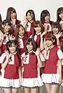 Atsuko Maeda, Yûko Ôshima, Minami Takahashi, Sayaka Akimoto, Mariko Shinoda, Tomomi Itano, Shizuka Ohya, Ayaka Kikuchi, Haruka Nakagawa, Chisato Nakata, Natsumi Matsubara, Haruka Katayama, Aki Takajô, Miku Tanabe, Sayaka Nakaya, Ami Maeda, Asuka Kuramochi, Mayumi Uchida, and Misaki Iwasa in AKB48 Show! (2013)