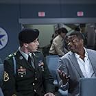 Chris Tucker and Garrett Hedlund in Billy Lynn's Long Halftime Walk (2016)