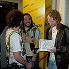 Jamie signing autographs at Blender Magazine's birthday party with Steve and friends.