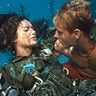 Denise Quiñones and Justin Hartley in Aquaman (2006)