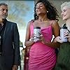 George Clooney, Julia Garner, and Simone Ashley in Nespresso: The Bet (2023)