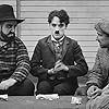 Charles Chaplin, Frank J. Coleman, and Tom Wilson in The Immigrant (1917)