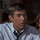 James Coburn in Dead Heat on a Merry-Go-Round (1966)