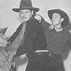 Buzz Barton, Jack Luden, and Harry Woods in Rolling Caravans (1938)