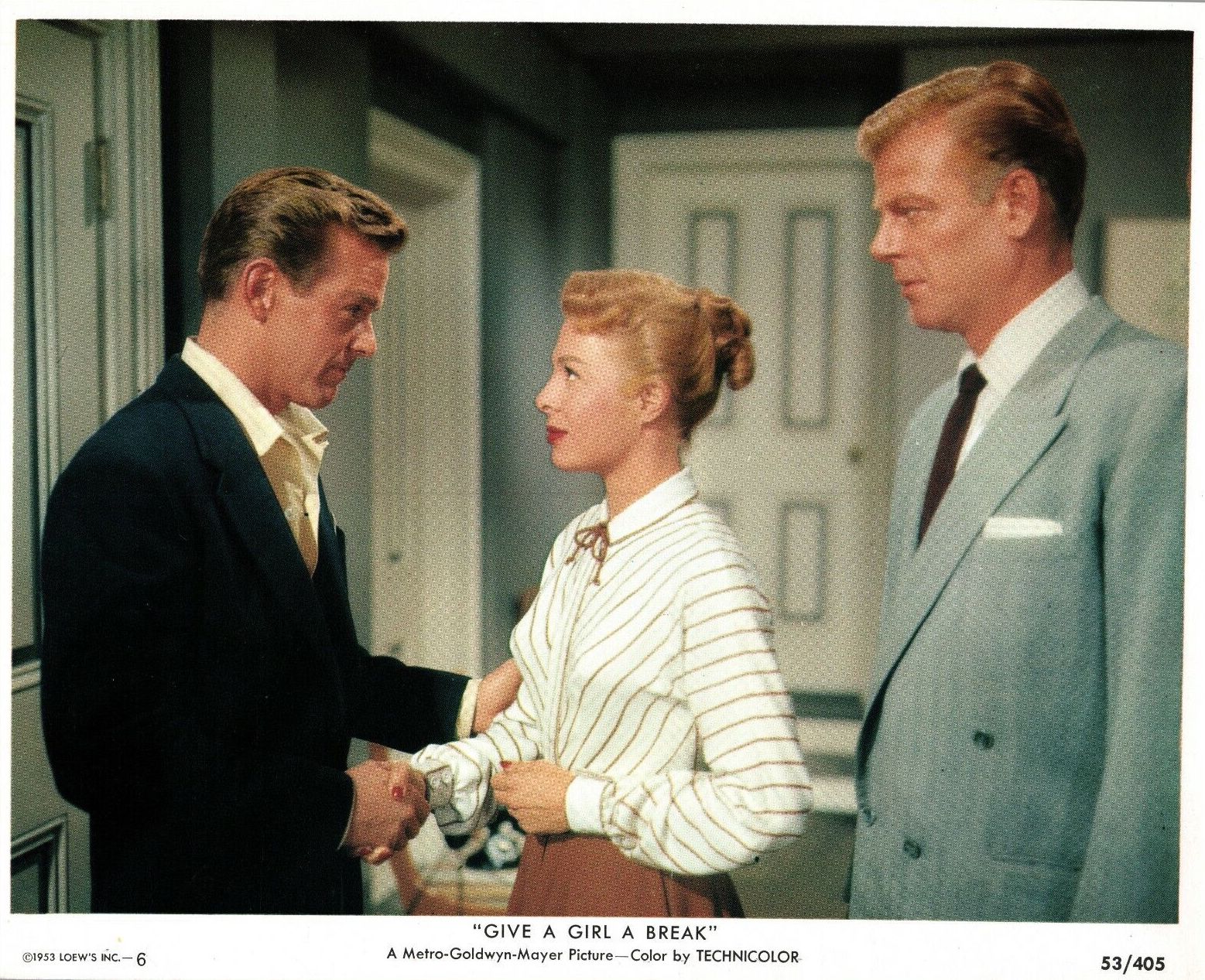 Gower Champion, Marge Champion, and William Ching in Give a Girl a Break (1953)