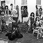 Dolly Parton, Gail Benedict, Valerie Leigh Bixler, Terry Calloway, Leslie Cook, Carol Culver, Lorraine Fields, Trish Garland, Lee Lund, Paula Lynn, Lily Mariye, Jennifer Nairn-Smith, Andrea Pike, Terri Treas, Melanie Winter, and Sandi Johnson in The Best Little Whorehouse in Texas (1982)