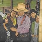 John Wayne, Edward Peil Sr., Bob Card, Ray Corrigan, Eva McKenzie, Jane Keckley, Ruth Rogers, and Max Terhune in The Night Riders (1939)