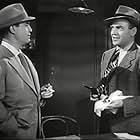 Richard Lane and Chester Morris in Boston Blackie Booked on Suspicion (1945)