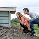 Yannick Bisson and Candace Cameron Bure in The Julius House: An Aurora Teagarden Mystery (2016)