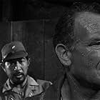 Dale Ishimoto and John Mills in King Rat (1965)