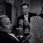 Hugh Dempster and John Sutton in The Fan (1949)