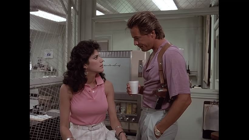 Don Johnson and Saundra Santiago in Miami Vice (1984)