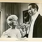 Christopher Lee and Eva Gabor in The Truth About Women (1957)