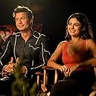 Anders Holm and Monica Barbaro in At Midnight (2023)