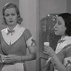 Joan Bennett and Doris Canfield in Big Brown Eyes (1936)