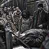 John Hurt, Chris Evans, Song Kang-ho, Octavia Spencer, and Luke Pasqualino in Snowpiercer (2013)