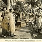 Acquanetta, Dick Botiller, Nestor Paiva, and John Maxwell in Rhythm of the Islands (1943)