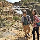 John Paul Ruttan and Ella Ballentine view the spectacular African falls in Against The Wild: Survive The Serengeti. May 2015, South Africa.