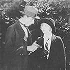 Frank Lackteen and Allene Ray in The Green Archer (1925)