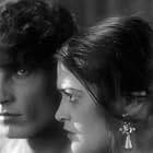 Andrei Abrikosov and Emma Tsesarskaya in And Quiet Flows the Don (1930)