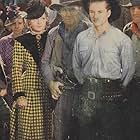 Paul Guilfoyle, Harry Carey, Tim Holt, Bob Kortman, and Esther Muir in The Law West of Tombstone (1938)