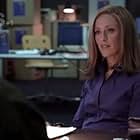 Kim Raver in The Nine (2006)