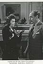Douglass Dumbrille and Marjorie Weaver in Murder Among Friends (1941)