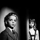 June Cowell and Martin Stephens in Village of the Damned (1960)