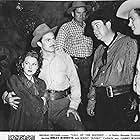 Kirk Alyn, Smiley Burnette, Sunset Carson, Ellen Hall, and Frank Jaquet in Call of the Rockies (1944)