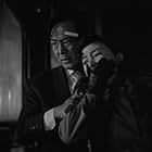 Michitarô Mizushima and Misako Watanabe in Take Aim at the Police Van (1960)