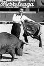 Herb Alpert with fake bull in bull ring, 1966