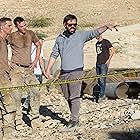 Nicholas Hoult, Logan Marshall-Green, and Fernando Coimbra in Sand Castle (2017)
