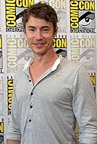 Tom Wisdom at an event for Dominion (2014)