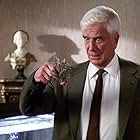 Leslie Nielsen in The Naked Gun: From the Files of Police Squad! (1988)