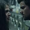 Taylor Lautner and Marie Avgeropoulos in Tracers (2015)