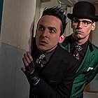 Robin Lord Taylor and Cory Michael Smith in Gotham (2014)