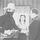 Kenneth MacDonald, Charles Starrett, and Luana Walters in The Durango Kid (1940)