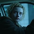 Julia Garner in The Cousin of Death (2022)