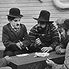 Charles Chaplin, Frank J. Coleman, and Tom Wilson in The Immigrant (1917)