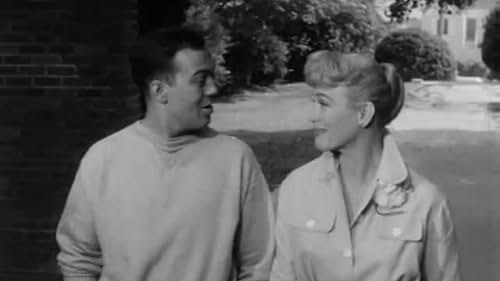 Miss Brooks teaches English at Madison High, rents a room from Mrs. Davis, gets rides to school with student Walter, fights with Principal Conklin, and tries to snag shy biology teacher Boynton.