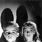 June Cowell and Martin Stephens in Village of the Damned (1960)