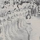 Yvonne De Carlo, Sugar Geise, Julie Milton, Gale Storm, Jan Wiley, Sylvia McKay, Jean Forman, and Flower Parry in Rhythm Parade (1942)