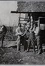 Rex De Rosselli, William Duncan, and Tom Mix in A Cowboy's Best Girl (1912)