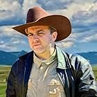 Andrew Clark as Sheriff Arlo Wolff in "Going Home" web series (2024)