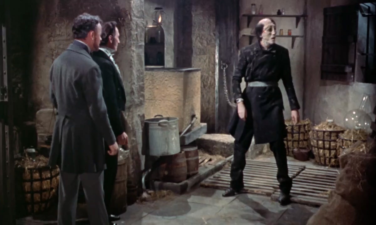 Christopher Lee, Peter Cushing, and Robert Urquhart in The Curse of Frankenstein (1957)