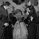 John Astin, Carolyn Jones, and Felix Silla in The Addams Family (1964)