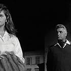Claudia Cardinale, Renato Baldini, and Angela Portaluri in Girl with a Suitcase (1961)