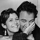 Carrie Fisher and Jim Belushi in The Man with One Red Shoe (1985)